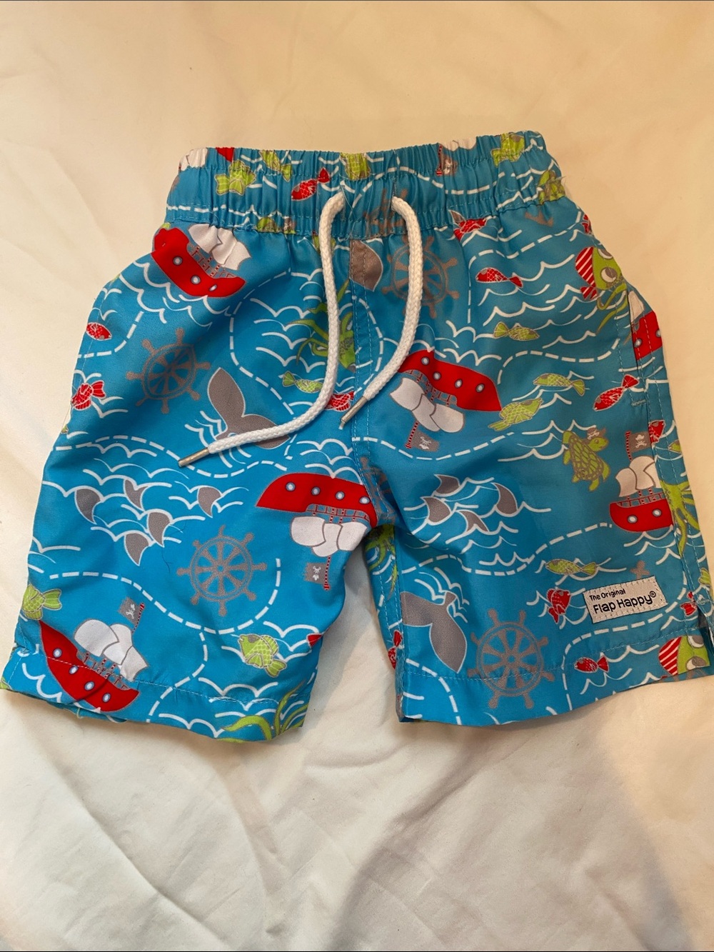 Flap Happy Turquoise Nautical Pirate Print Kids Swim Shorts with Red Accents